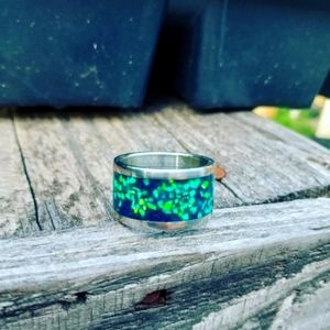 Beautiful bright sea foam green set in crushed vibrant blue opal.